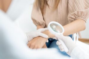 Dermatologist providing professional care for skin, hair, and nail concerns